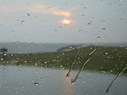 rain on car window, soft focus sunset. god i can be cheesy
