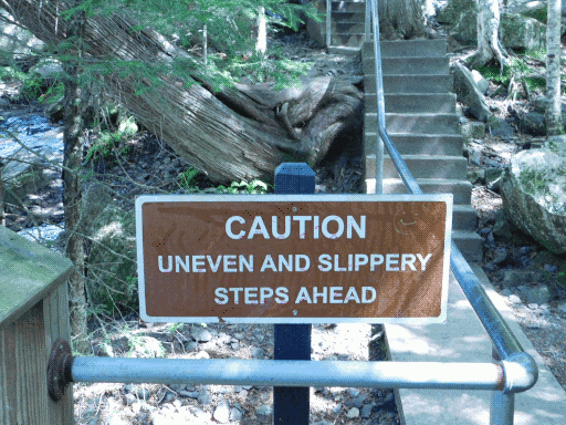 CAUTION: UNEVEN AND SLIPPERY STEPS AHEAD